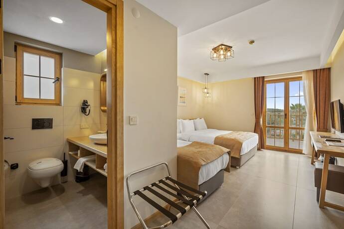 Imagen de la habitación del Zeyt-Inn Hotel. Foto 19