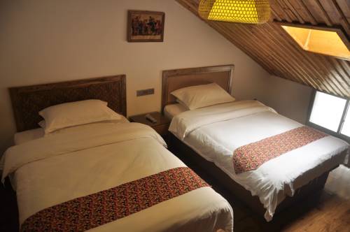 Imagen de la habitación del Zhangjiajie Jijiehao Inn. Foto 1