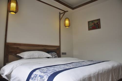 Imagen de la habitación del Zhangjiajie Jijiehao Inn. Foto 2