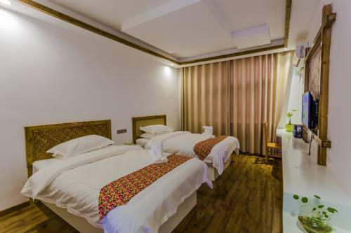 Imagen de la habitación del Zhangjiajie Jijiehao Inn. Foto 4