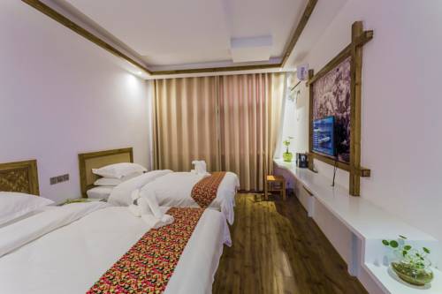 Imagen de la habitación del Zhangjiajie Jijiehao Inn. Foto 5