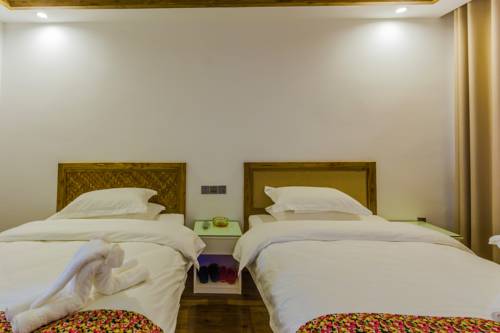 Imagen de la habitación del Zhangjiajie Jijiehao Inn. Foto 6