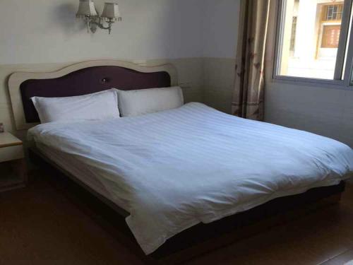 Imagen de la habitación del Zhangpu Changchun Inn. Foto 4