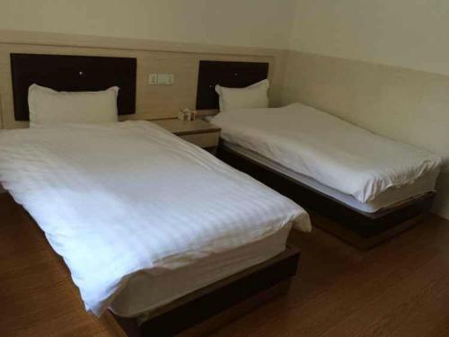 Imagen de la habitación del Zhangpu Changchun Inn. Foto 5