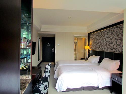 Imagen de la habitación del Zhaorui International. Foto 2