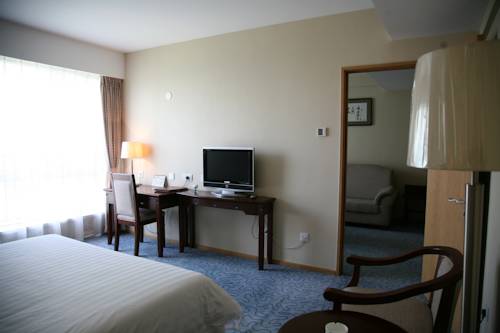 Imagen de la habitación del Zhongguan Xinyuan Global Village Pku. Foto 6
