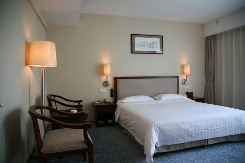 Imagen de la habitación del Zhongguan Xinyuan Global Village Pku. Foto 7