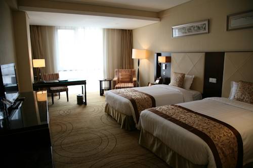 Imagen de la habitación del Zhongguan Xinyuan Global Village Pku. Foto 10