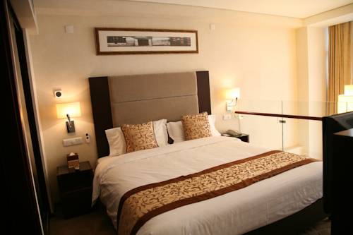 Imagen de la habitación del Zhongguan Xinyuan Global Village Pku. Foto 12