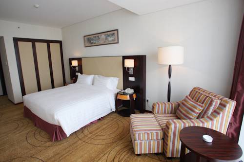 Imagen de la habitación del Zhongguan Xinyuan Global Village Pku. Foto 13