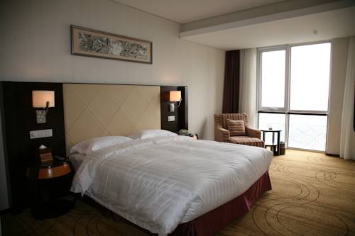 Imagen de la habitación del Zhongguan Xinyuan Global Village Pku. Foto 14