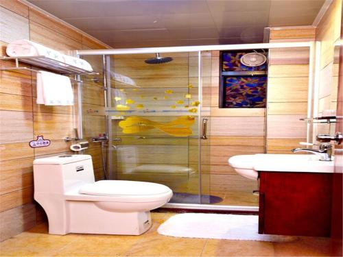 Imagen de la habitación del Zhongshan Xinghui International Apartment. Foto 7