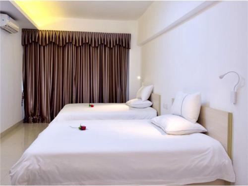 Imagen general del Zhongshan Xinghui International Apartment. Foto 1