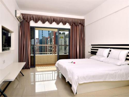 Imagen general del Zhongshan Xinghui International Apartment. Foto 3