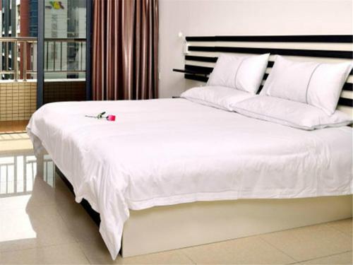 Imagen general del Zhongshan Xinghui International Apartment. Foto 4
