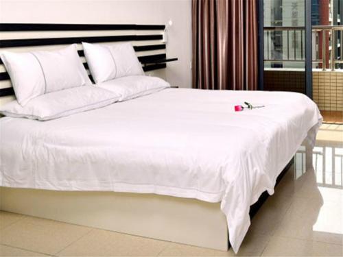 Imagen general del Zhongshan Xinghui International Apartment. Foto 6