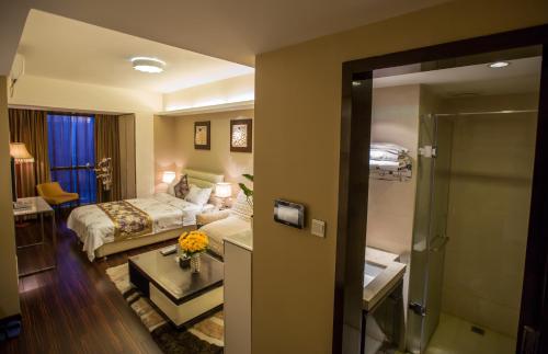 Imagen de la habitación del Zixinju Aparthotel. Foto 5