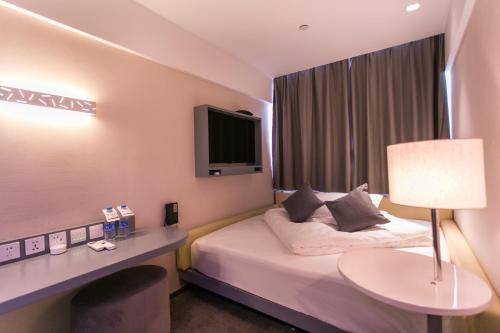 Imagen de la habitación del Zsmart Hotel. Foto 7