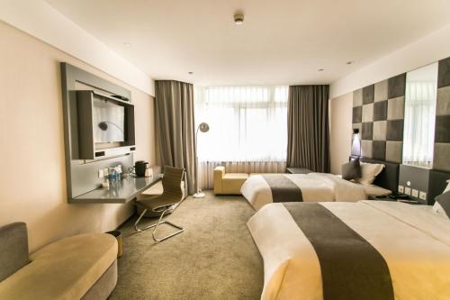 Imagen de la habitación del Zsmart Hotel. Foto 8