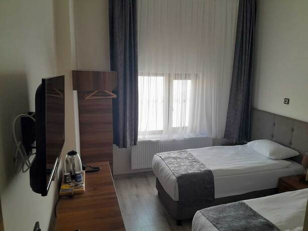 Imagen de la habitación del Zumrut Palas Hotel. Foto 12