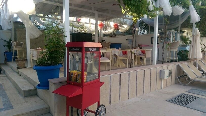 Imagen del bar/restaurante del Zuzu's Kitchen and Apartments. Foto 14