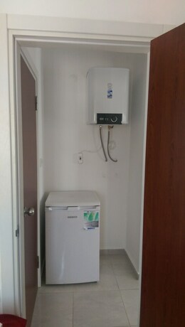 Imagen de la habitación del Zuzu's Kitchen and Apartments. Foto 23