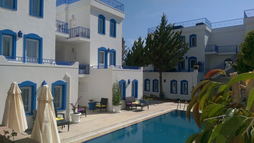 Imagen de la piscina del Zuzu's Kitchen and Apartments. Foto 28