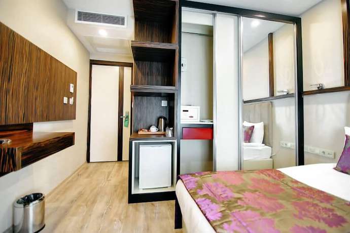 Imagen de la habitación del actuel life hotel. Foto 3