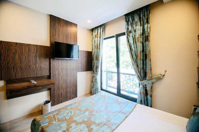 Imagen de la habitación del actuel life hotel. Foto 8