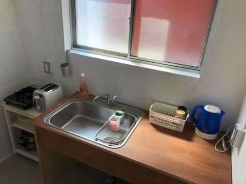 Imagen general del カフェバー&ゲストハウスennova. Foto 7