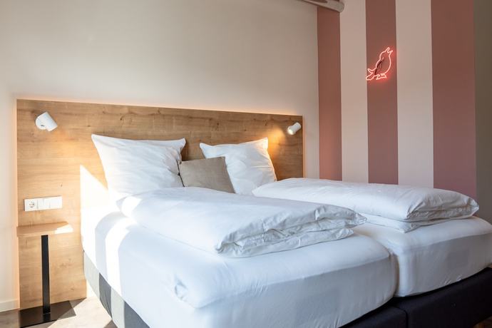 Imagen de la habitación del coucou Hotel. Foto 13