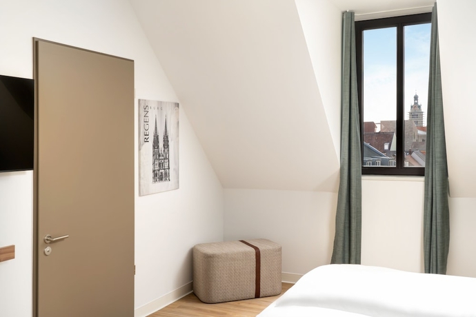 Imagen de la habitación del elaya hotel regensburg city center. Foto 9