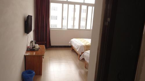 Imagen general del e&lsquo;meishan jintong inn. Foto 2