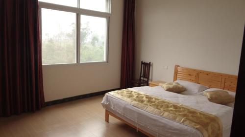 Imagen general del e&lsquo;meishan jintong inn. Foto 3