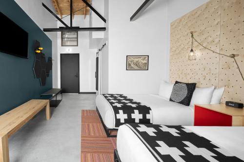 Imagen de la habitación del evo Hotel. Foto 18