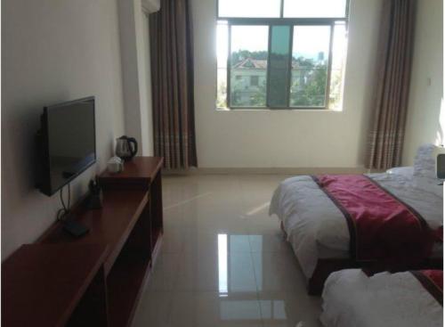 Imagen general del fuying business hotel( 2nd southring branch）. Foto 4