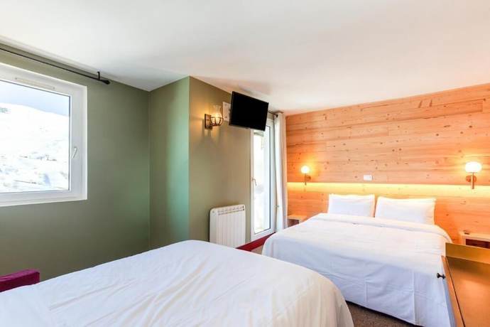 Imagen de la habitación del hotel Turan. Foto 7