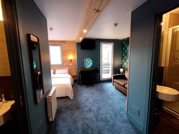 Imagen de la habitación del hotel Turan. Foto 9