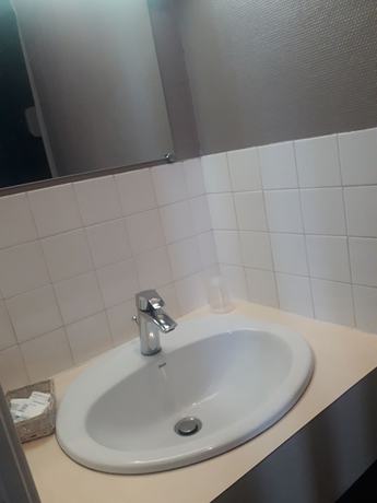 Imagen de la habitación del hotel le Normand. Foto 19