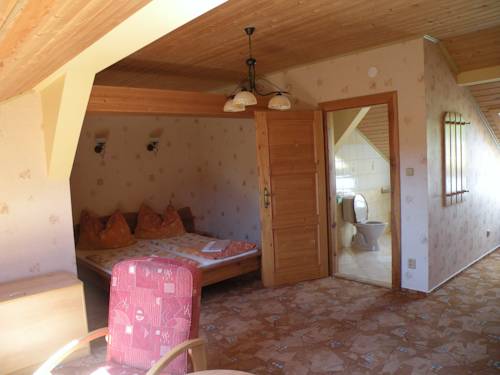 Imagen de la habitación del hotel lesní dům. Foto 9