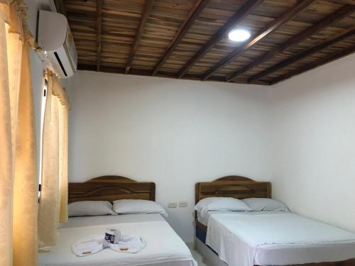 Imagen de la habitación del hotel tropical. Foto 19