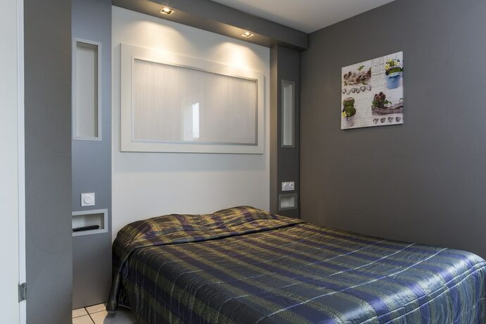 Imagen de la habitación del inital by balladins Lyon Chanas. Foto 13