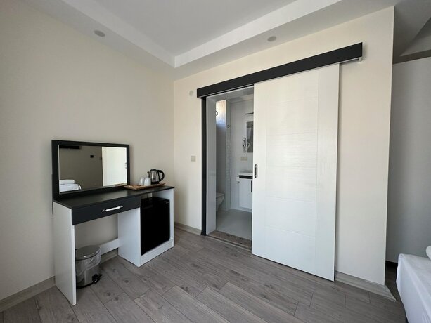 Imagen de la habitación del Şirin Garden Ayvalık. Foto 15