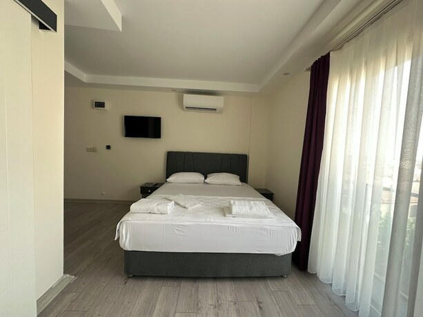 Imagen de la habitación del Şirin Garden Ayvalık. Foto 16