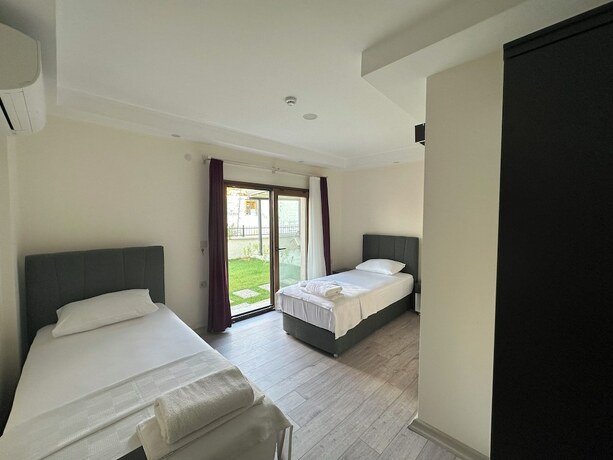 Imagen de la habitación del Şirin Garden Ayvalık. Foto 18