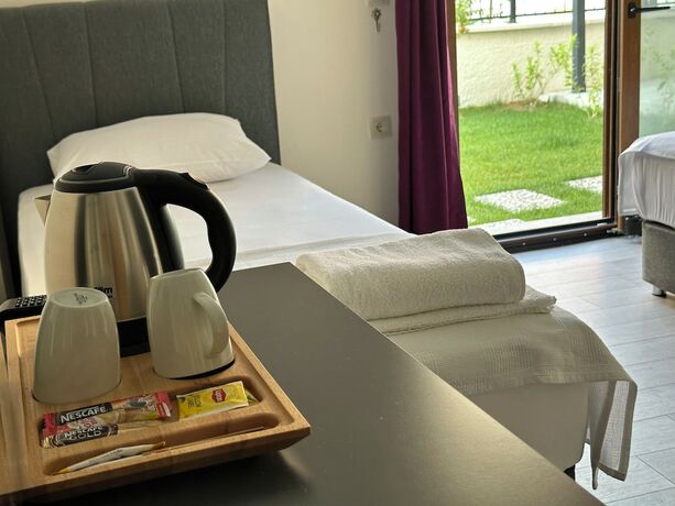 Imagen de la habitación del Şirin Garden Ayvalık. Foto 19