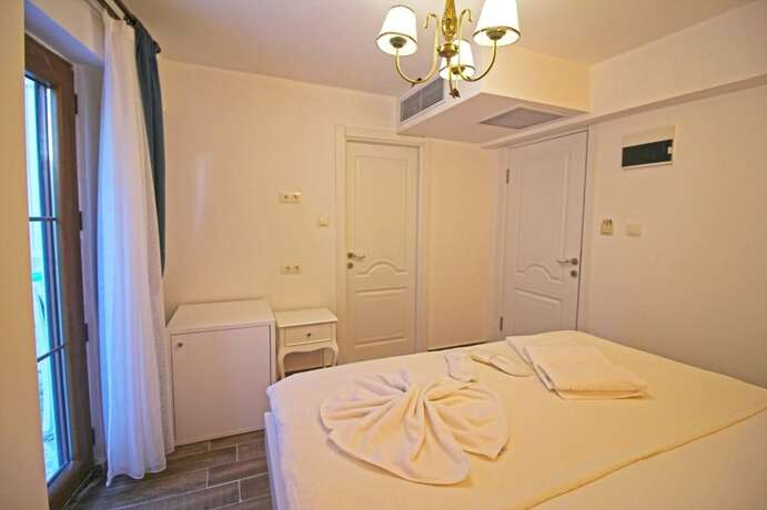 Imagen de la habitación del İkizler Otel Bozcaada. Foto 15