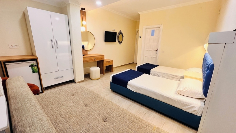 Imagen de la habitación del kumsal apart otel. Foto 3