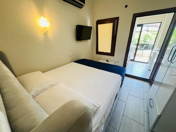Imagen de la habitación del kumsal apart otel. Foto 6