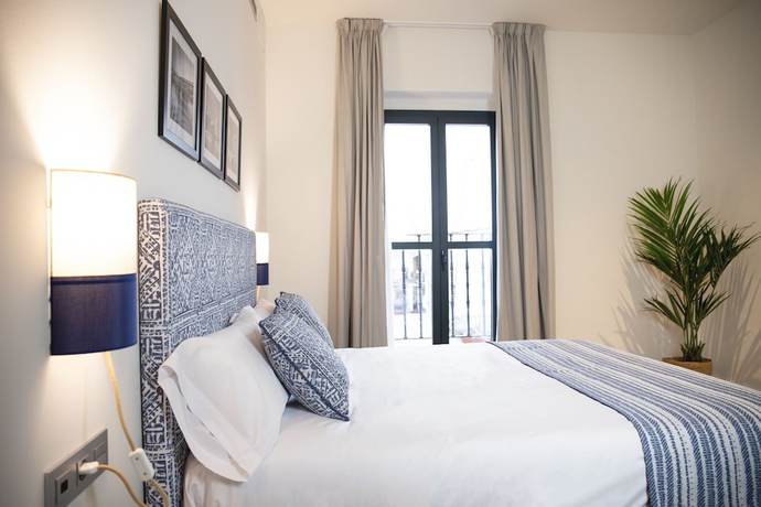 Imagen de la habitación del nQn Aparts and Suites Sevilla. Foto 8